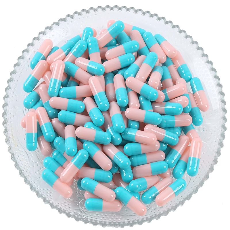 Pink and blue empty capsule shells - color example