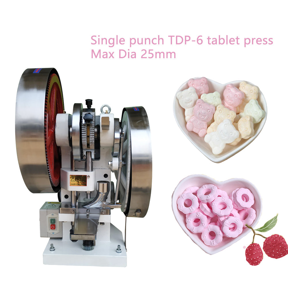TDP-6 tablet press and sample formed tablets